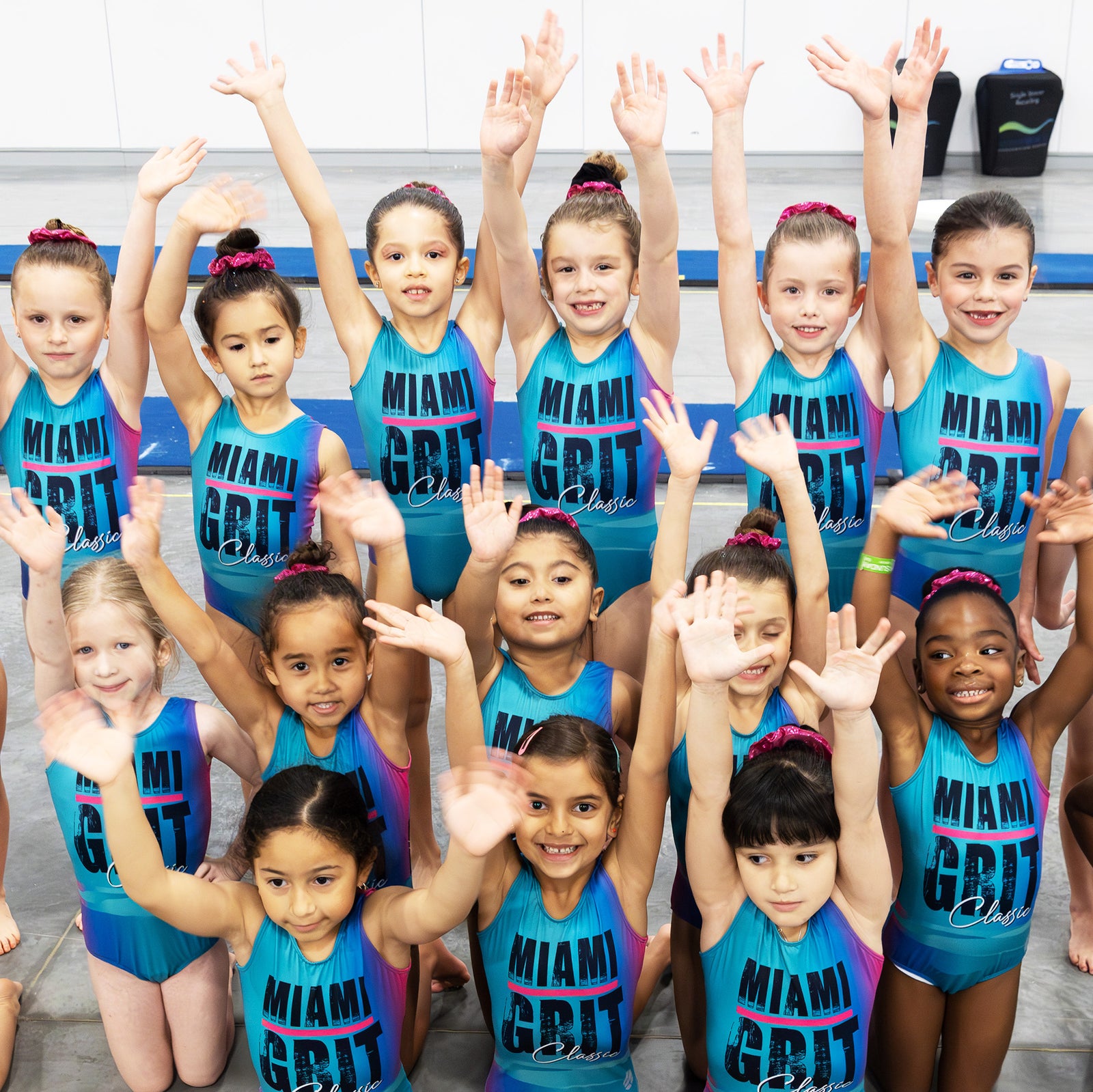 Girls gymnastics leotard back view with Miami Grit 2025 competition design