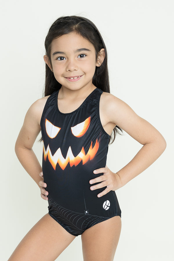 Girls gymnastics leotard front view with pumpkin Halloween print design