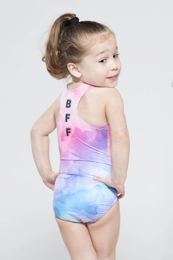 Girls gymnastics leotard front view with best friends themed print design