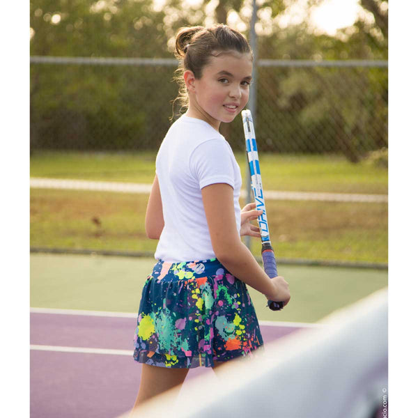 Girls tennis skort back view with splash paint mesh tennis design