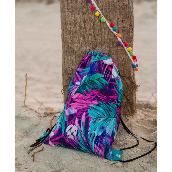 Girls drawstring backpack front view with tropical leaves print