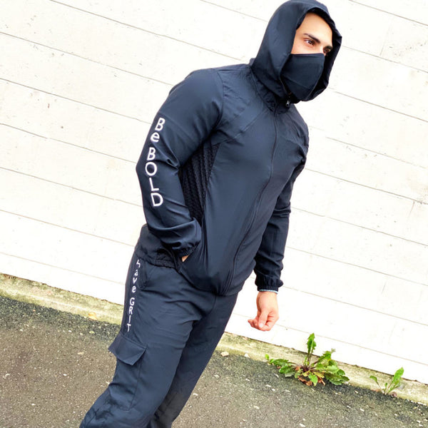 Men's jacket and jogger set front view with solid black protective design
