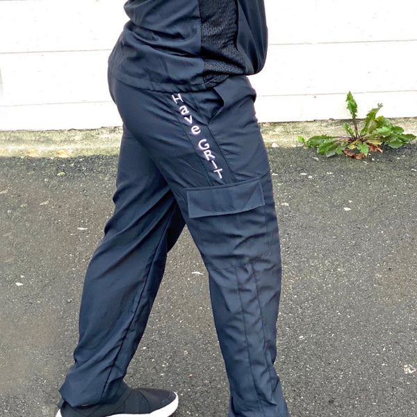 Men's joggers side view with solid black design