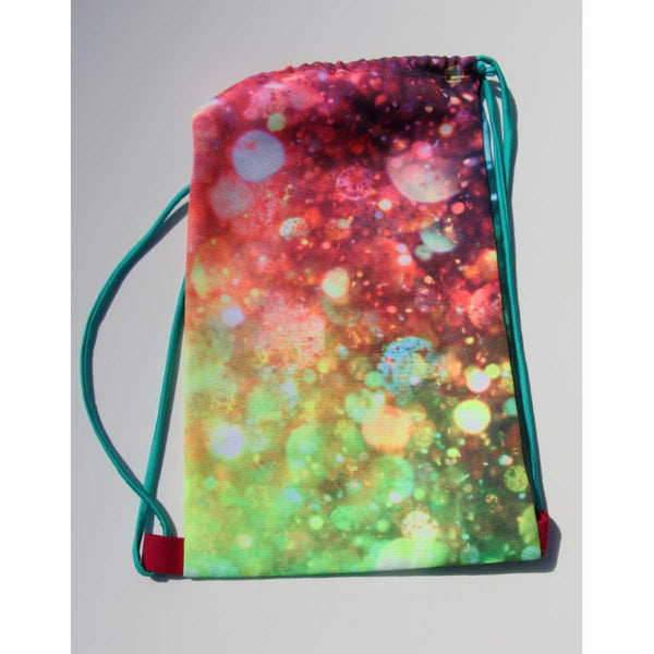 Girls drawstring backpack back view with confetti print